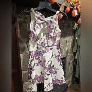 Beutiful, girls formal dress. With flowers and a bow!